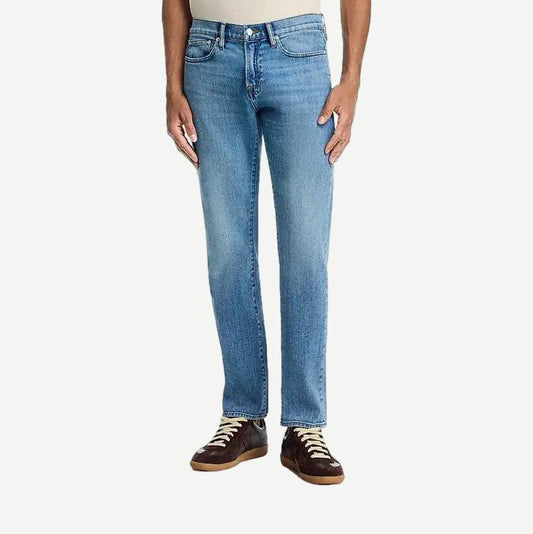 Blue modern straight-leg denim jeans by Frame Denim, featuring a clean, classic design with a tailored fit.