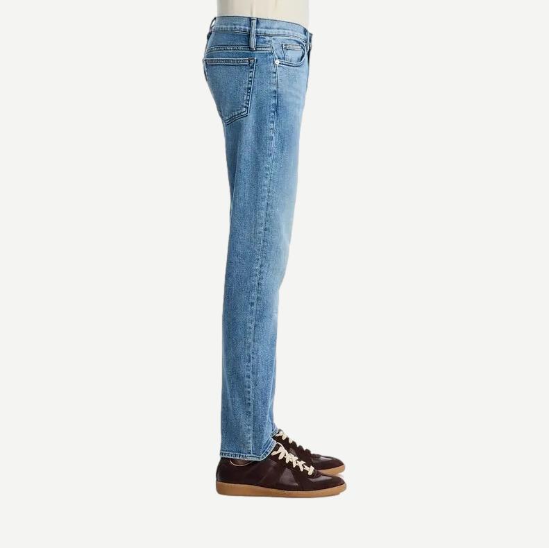 Slim fit Frame Denim Modern Straight Jean in Crosswalk denim, showing classic five-pocket design and clean stitching.