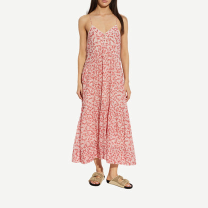 Red Isabel Marant Sabba Dress shown on a model, featuring a stylish, flowing design with long sleeves and a fitted waist.