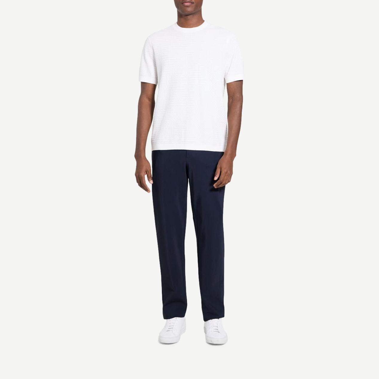 Theory Damian SS Top in winter ivory, a stylish short-sleeve t-shirt with a clean, minimalist design and soft fabric.