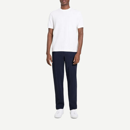 Theory Damian SS Top in winter ivory, a stylish short-sleeve t-shirt with a clean, minimalist design and soft fabric.