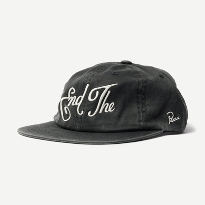 Black 6-panel hat by Parra featuring a structured design and flat brim, displayed on a clean background.