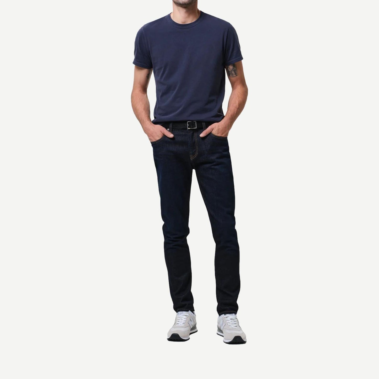 Citizens of Humanity London Cashmere Falcon denim jeans displayed on a hanger, showcasing classic blue denim with subtle fading.