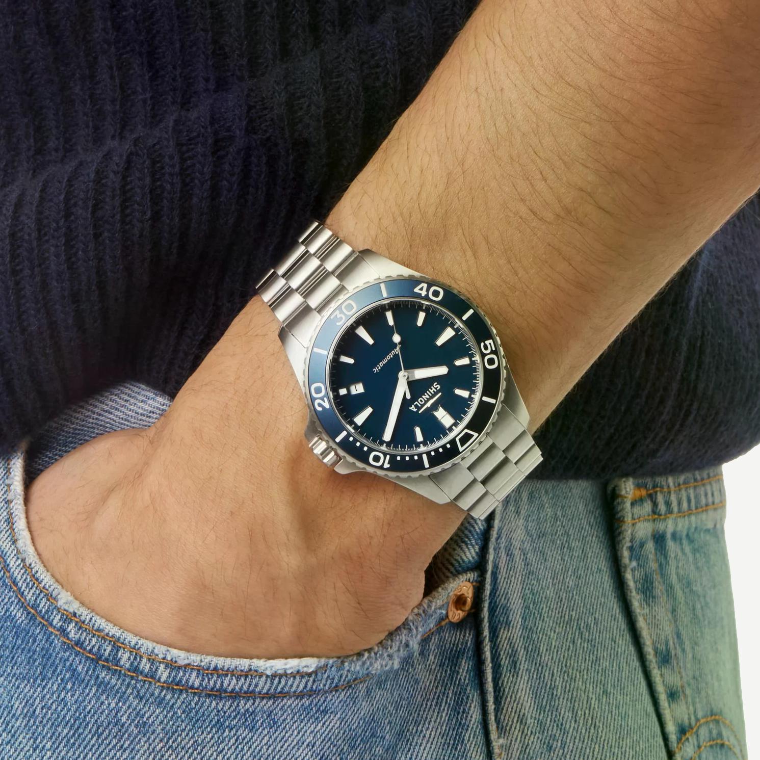 Shinola Monster Automatic Lake Michigan 39mm watch gift set with blue dial, Mother-of-Pearl accents, and silver case.