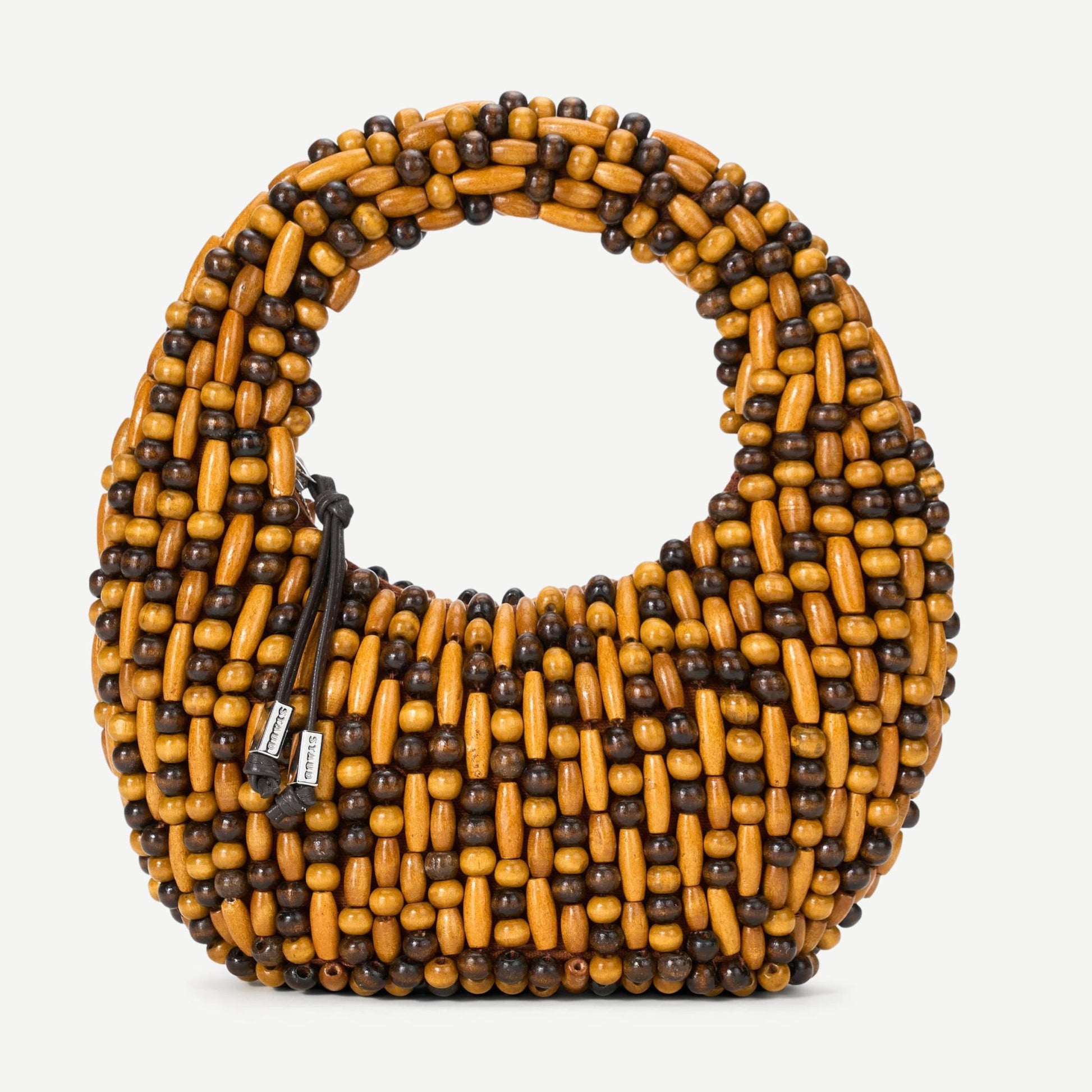 Staud Reef Bag with multi wood beads purse featuring a woven design and floral accents, showcasing its stylish and handcrafted details.