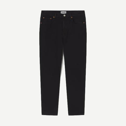Agolde Curtis Jean Kelvin in denim, showcasing classic fit with light wash and subtle fading, styled on a person.
