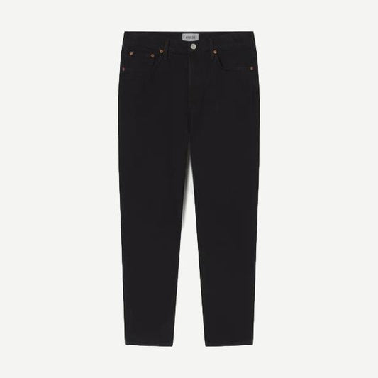 Agolde Curtis Jean Kelvin in denim, showcasing classic fit with light wash and subtle fading, styled on a person.