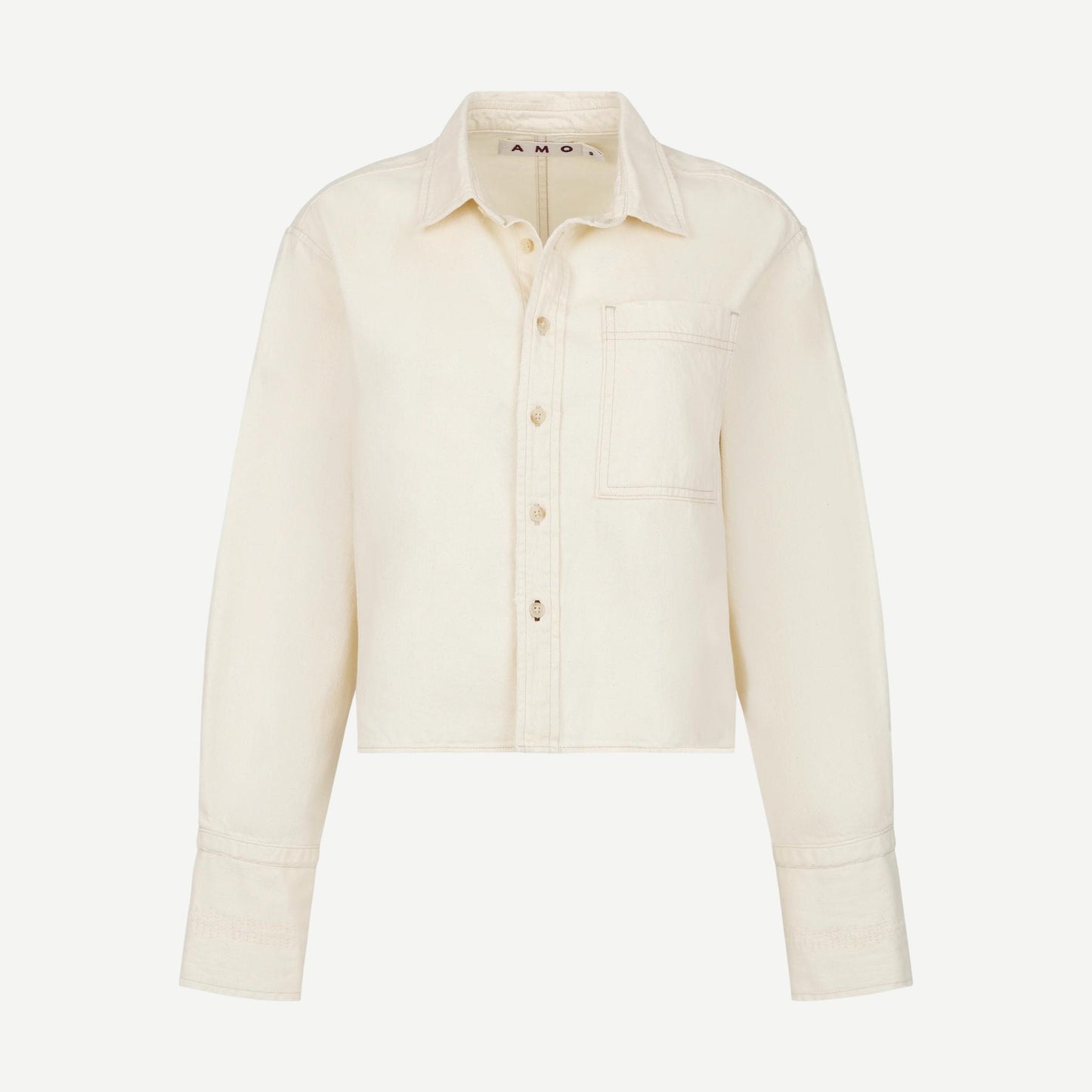 AMO Abigail long-sleeve shirt in bone color, soft fabric with a relaxed fit and classic collar, shown on a hanger.
