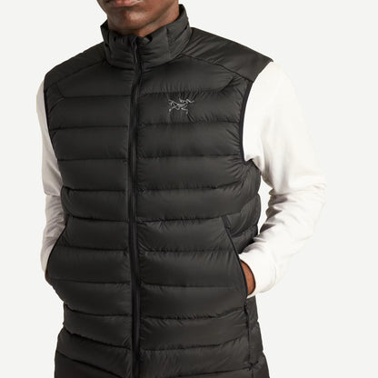 Men's black Cerium Vest by Arc'teryx, lightweight outerwear with a sleek design, shown in close-up detail.