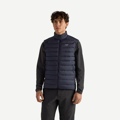 Black Arcteryx Cerium Vest for men with a sleek front view, showcasing lightweight insulation and a smooth, durable fabric exterior.