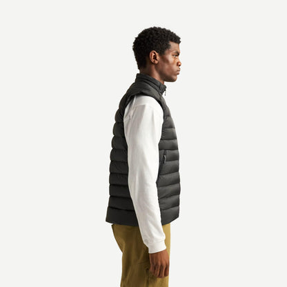 Black Arc'teryx Cerium Vest men's outerwear shown from the side view, highlighting lightweight insulated design and sleek fit.