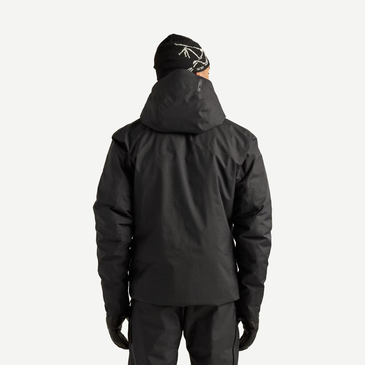 Black Arcteryx Macai Down Jacket for men, back view showing insulated outerwear with a sleek, streamlined design.