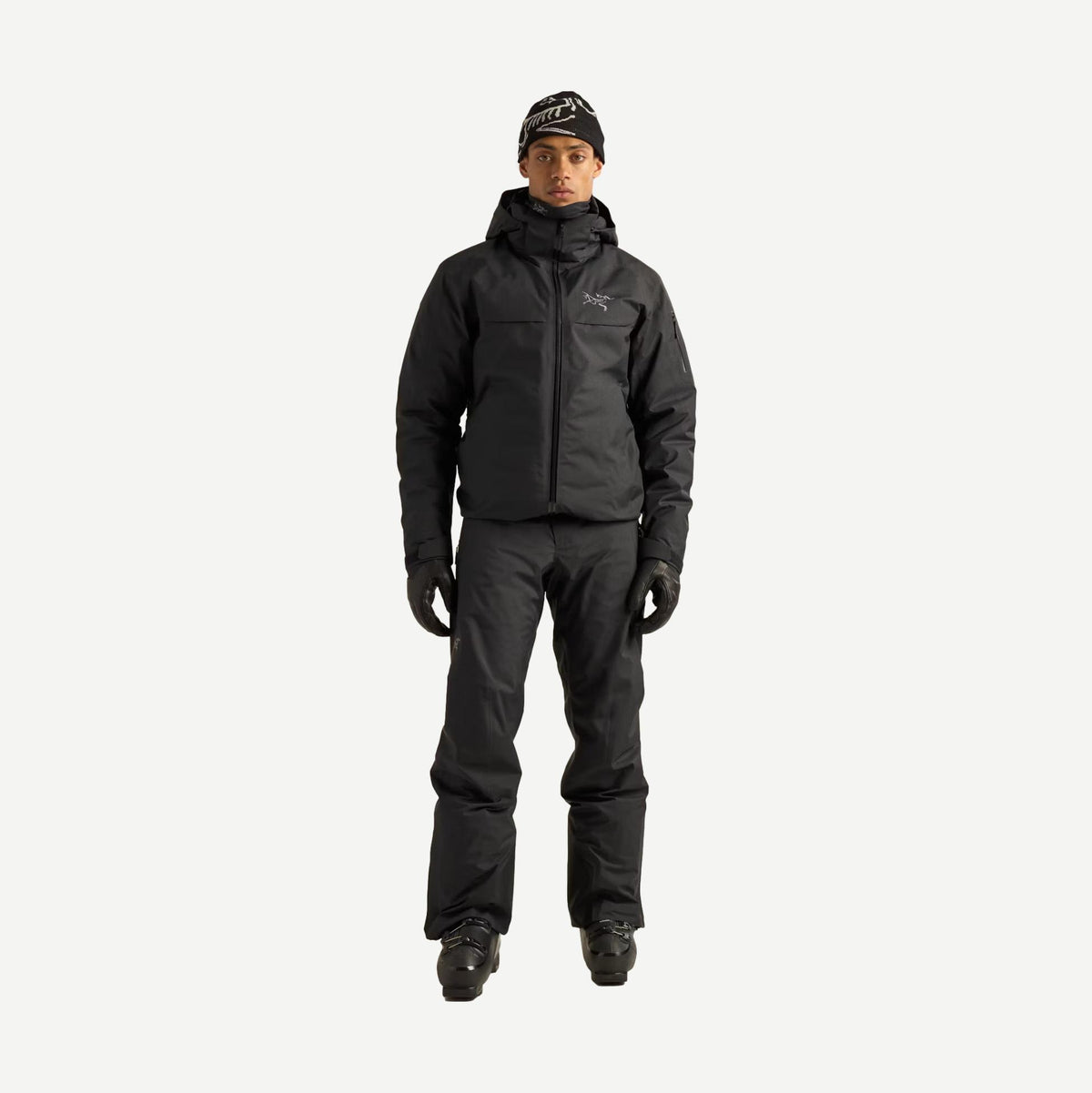 Black Arcteryx Macai Down Jacket for men, full-body view of the stylish, insulated outerwear designed for cold weather.