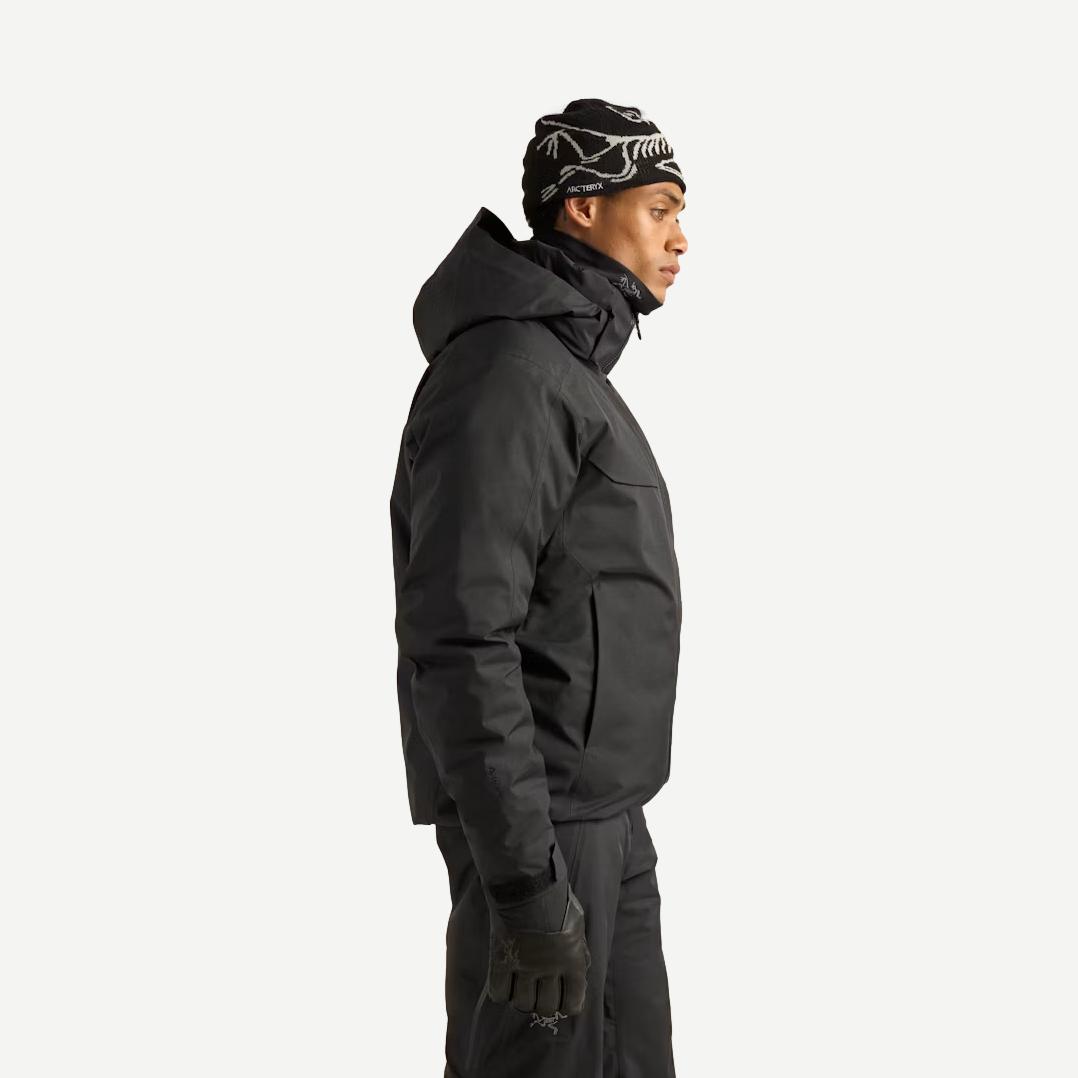 Men's black Arcteryx Macai Down Jacket outerwear, side view showing insulated design and sleek fit.