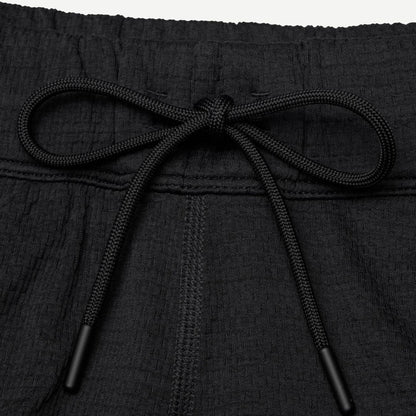 Reigning Champ Solotex Mesh Tiebreak Short 7-inch in black, lightweight athletic shorts with mesh fabric and a relaxed fit.