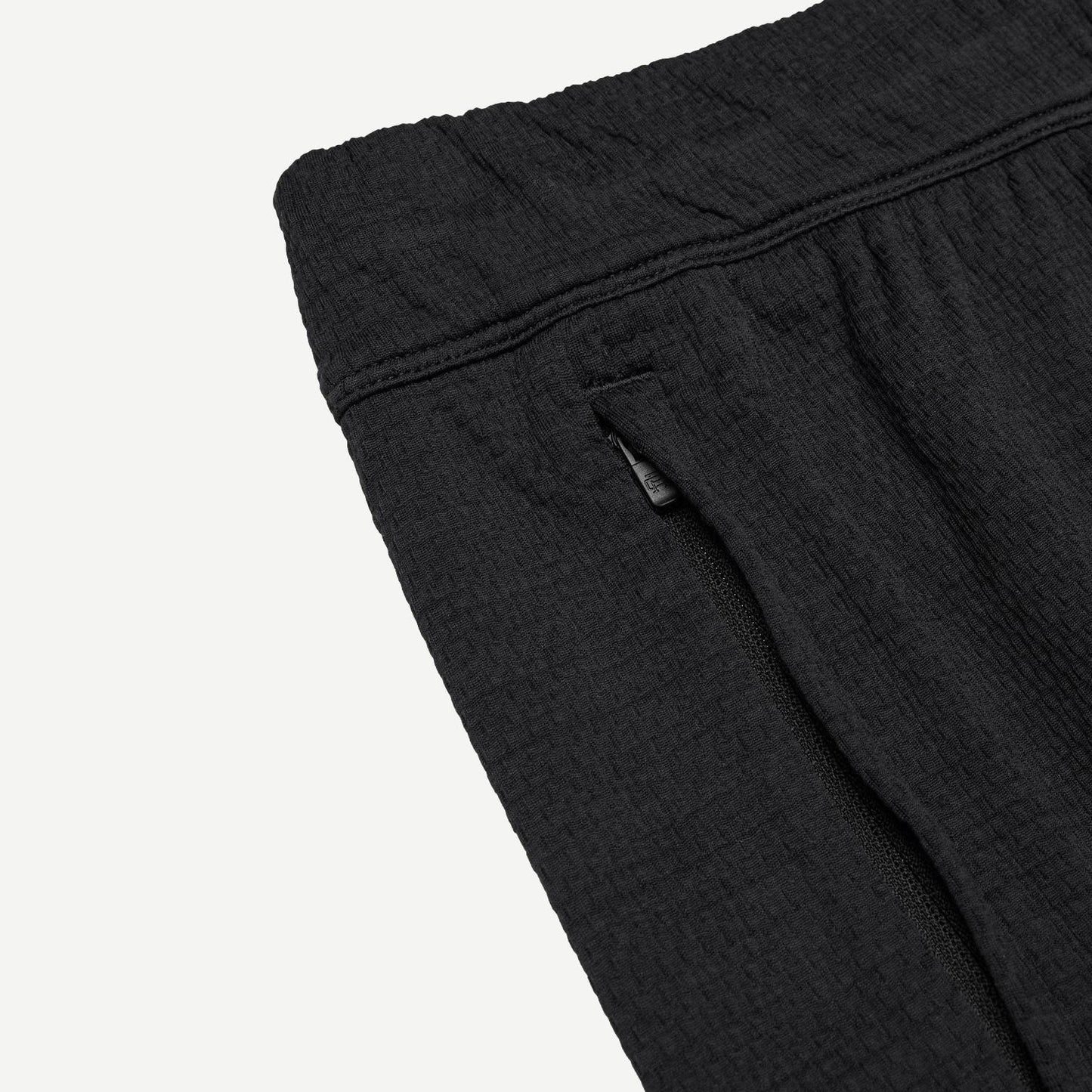Reigning Champ Solotex Mesh Tiebreak Short 7-inch in black, lightweight athletic shorts with mesh fabric and a relaxed fit.