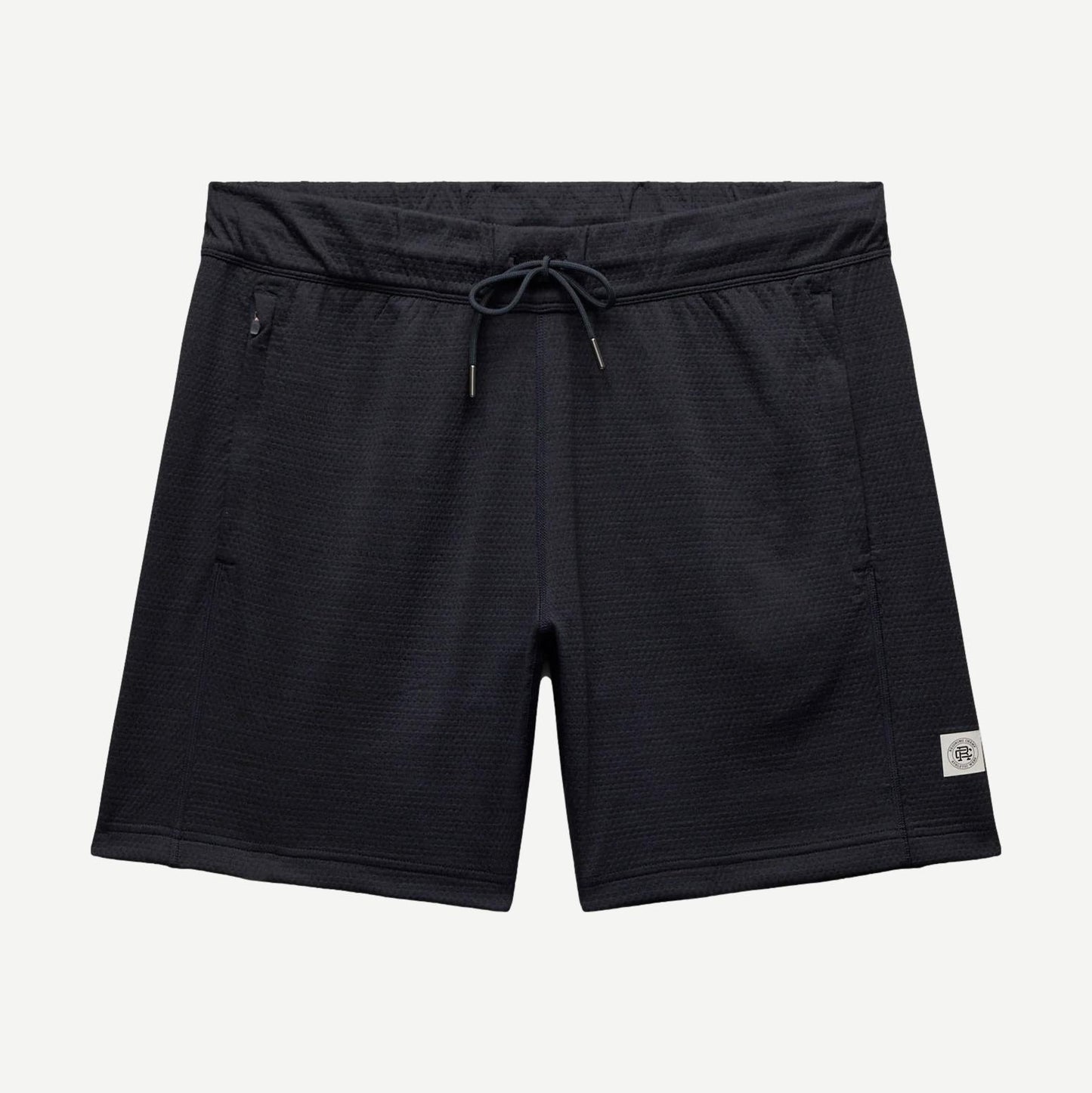 Reigning Champ navy Solotex mesh tiebreak short 7-inch length, lightweight athletic shorts with mesh fabric and elastic waistband.