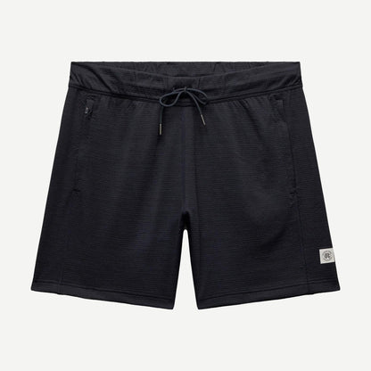 Reigning Champ navy Solotex mesh tiebreak short 7-inch length, lightweight athletic shorts with mesh fabric and elastic waistband.
