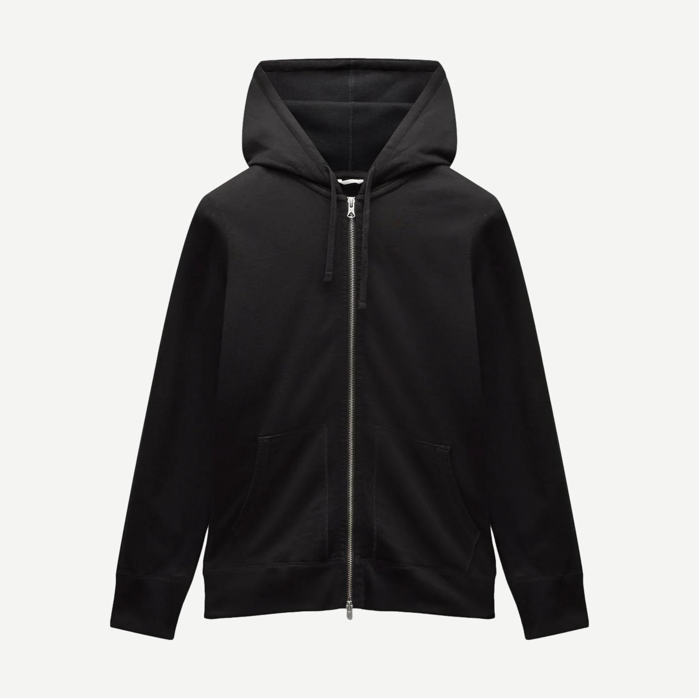 Black Reigning Champ midweight terry slim zip hoodie with front zipper and hood, displayed on a hanger.