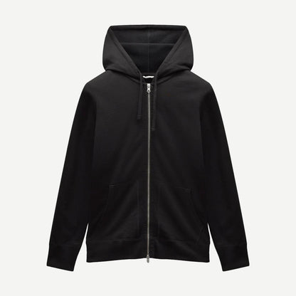 Black Reigning Champ midweight terry slim zip hoodie with front zipper and hood, displayed on a hanger.