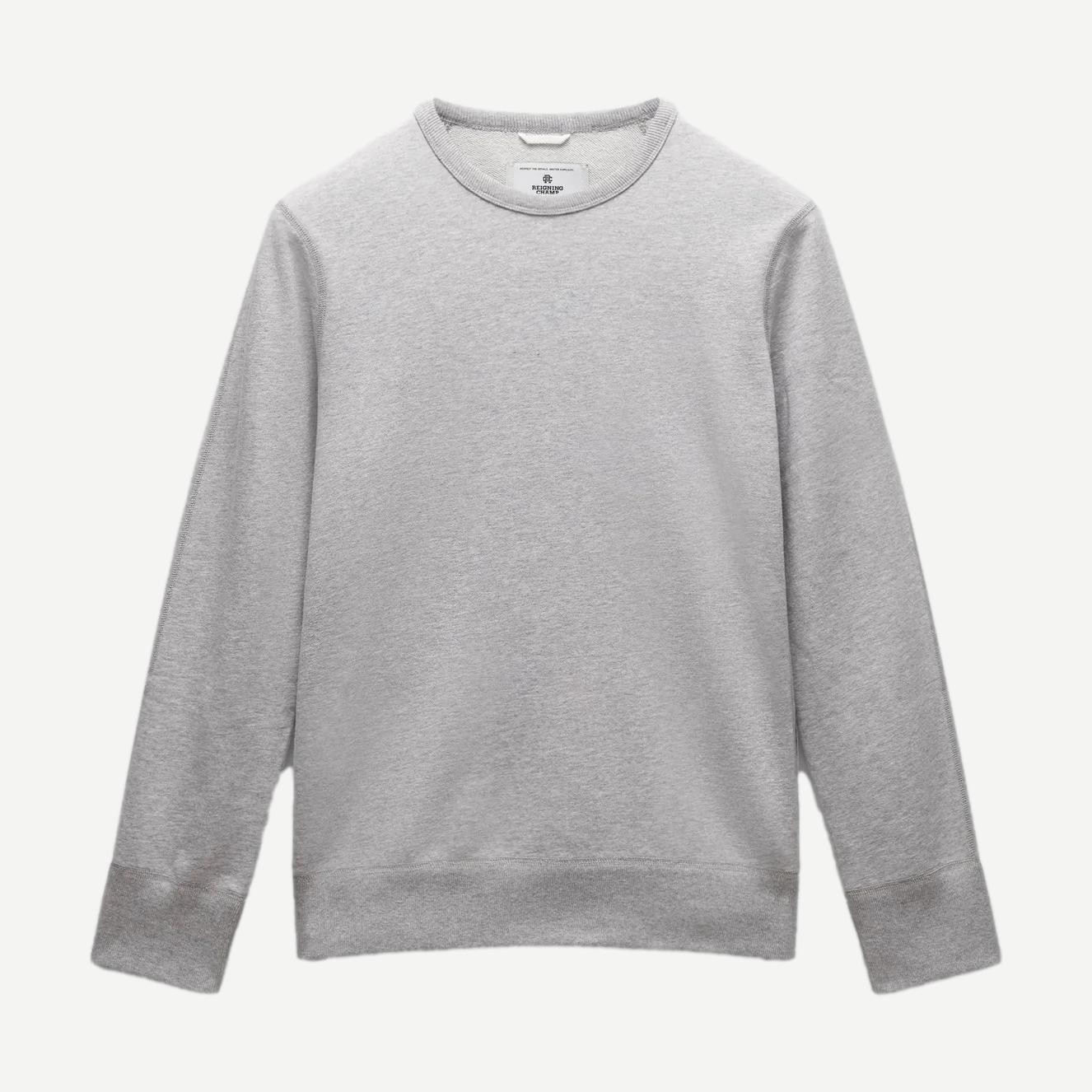 Reigning Champ midweight terry slim crewneck sweatshirt in Heather Grey, showcasing a close-up of the cozy, soft fabric and fit.