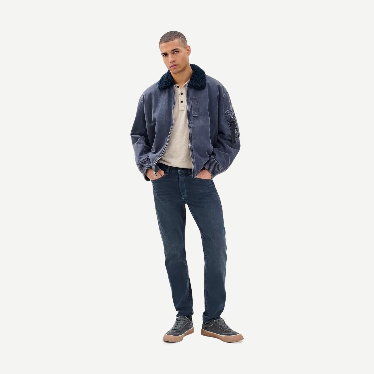 Rag and Bone Fit 2 Slim Authentic Minna denim jeans, slim fit style, shown on a model with a classic blue wash and clean stitching.