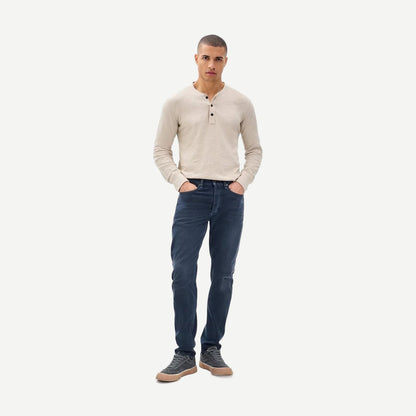 Rag and Bone Fit 2 Slim Authentics denim jeans in classic blue, featuring a slim fit and clean stitching, shown on a model.