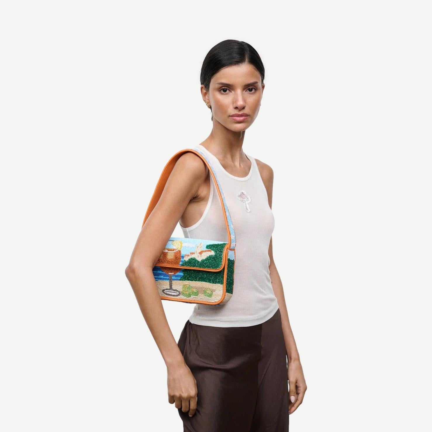 Staud Sunset Spritz Tommy beaded purse with colorful beads and compact design, perfect for stylish evenings.