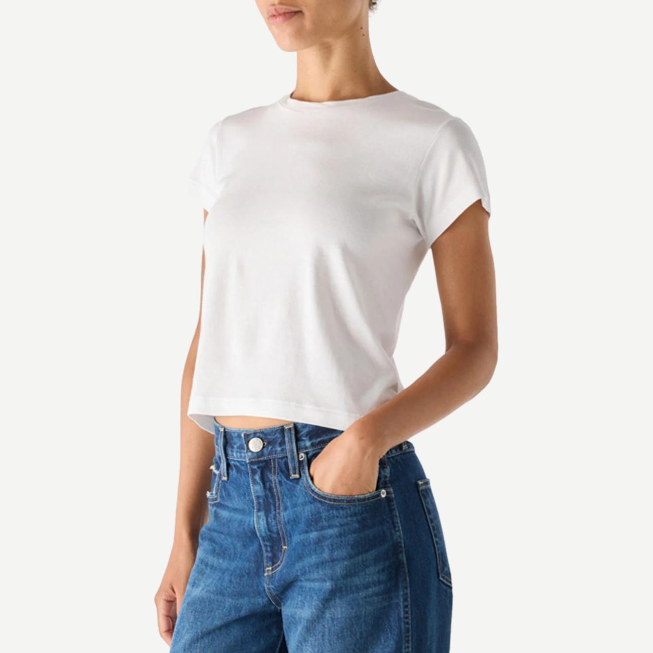 White Jade Tee from AMO, stylish cotton T-shirt featuring a relaxed fit and simple design, shown on a model.