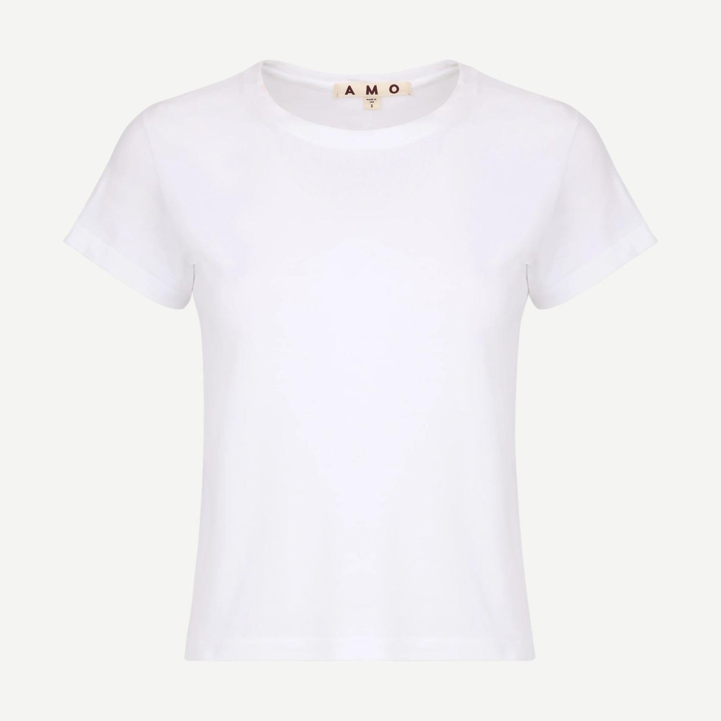 White Jade Tee by AMO, a stylish T-shirt with a classic fit and smooth fabric, displayed on a hanger.