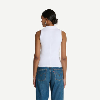 White Jaylin Polo Top by Nation LTD, close-up of the classic collared polo shirt with short sleeves and clean design.