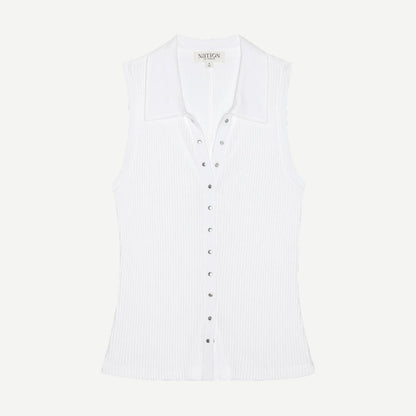 White Jaylin Polo Top by Nation LTD, featuring a classic polo design with a collar and short sleeves, shown on a plain background.