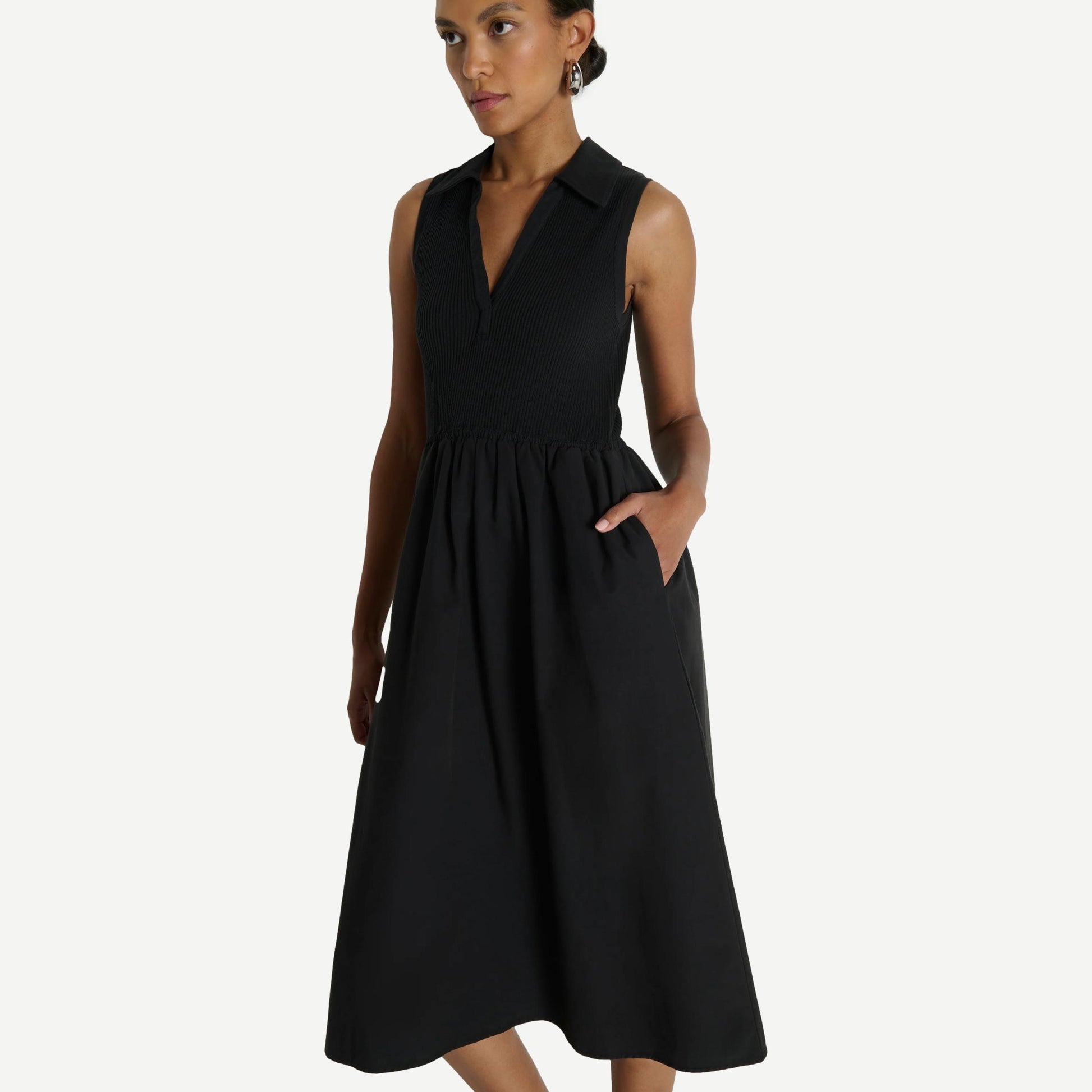 Jessica Nation LTD midi dress in jet black, featuring a flowing silhouette and elegant design, shown on a model.