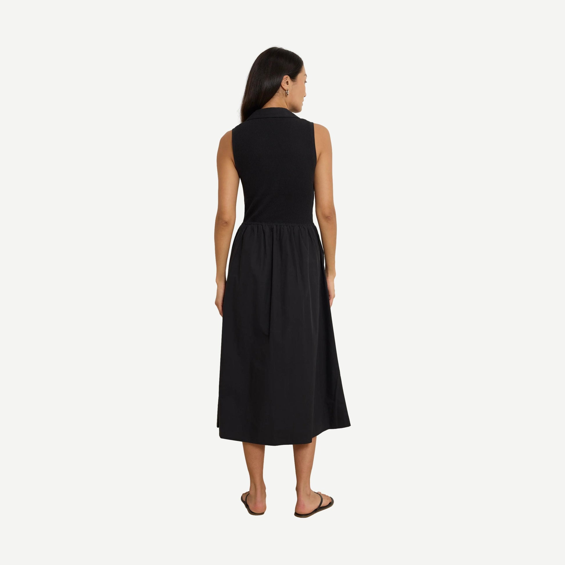 Jessica Midi Dress by Nation LTD in jet black, featuring a sleek, fitted silhouette and elegant midi length.