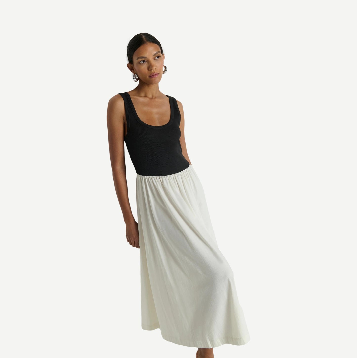 Karla midi dress by Nation LTD in porcelain color block with a fitted silhouette and elegant design, shown on a model.