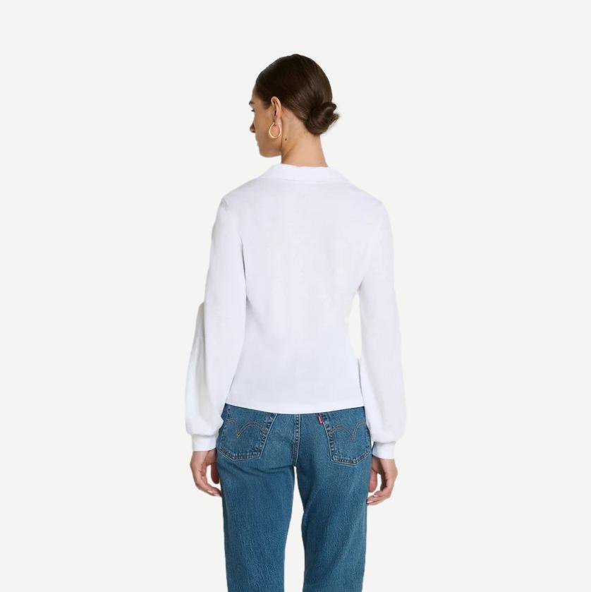 Kimberley Polo Tee by Nation LTD in optic white, featuring a classic fit and soft cotton fabric, displayed on a hanger.