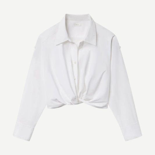 A.L.C. Leo Top in bright white, a stylish women's shirt with a sleek fit and minimalist design, shown on a hanger.