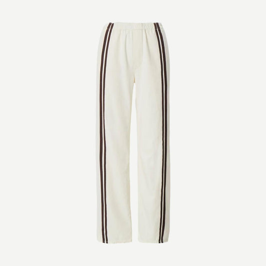 Rag and Bone Logan FTWT track pants in ecru sport fabric, featuring a relaxed fit and casual style for everyday wear.