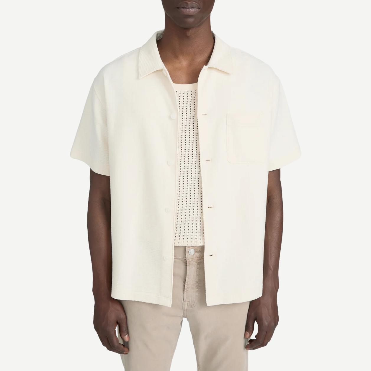 Cream Frame Denim jacquard short-sleeve button-down shirt with intricate woven pattern and classic collar.