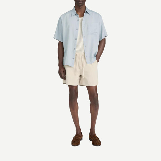 Blue grey striped lightweight short-sleeve button-up shirt by Frame Denim, shown on a hanger.