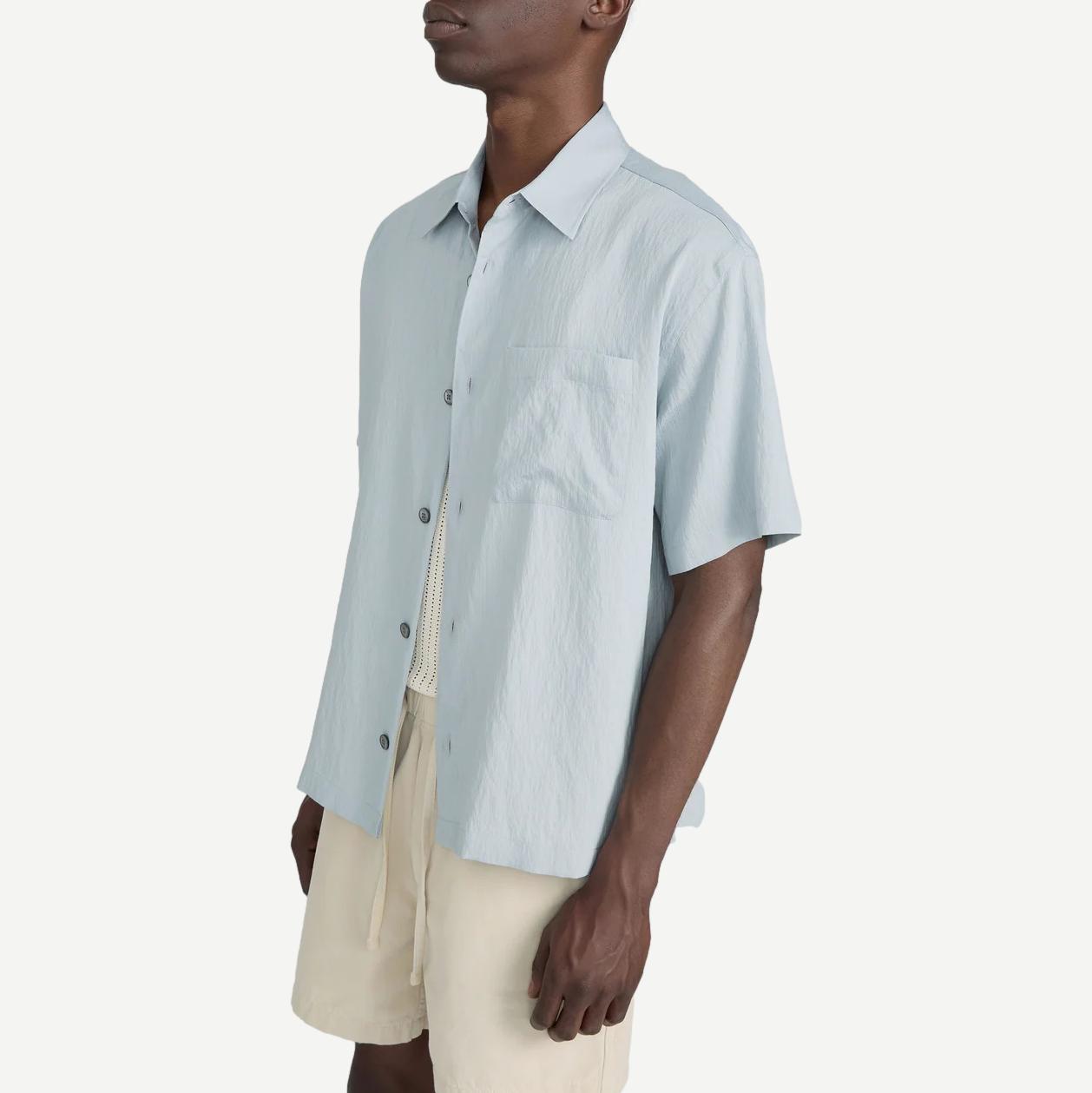 Frame Denim lightweight men's button-up shirt in blue grey stripe, short sleeves, casual fit, fabric detail visible.