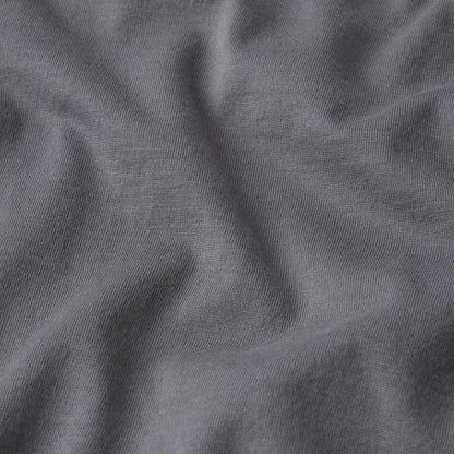 Light grey short-sleeve cotton T-shirt by Frame Denim, showing a close-up of the fabric and fit.