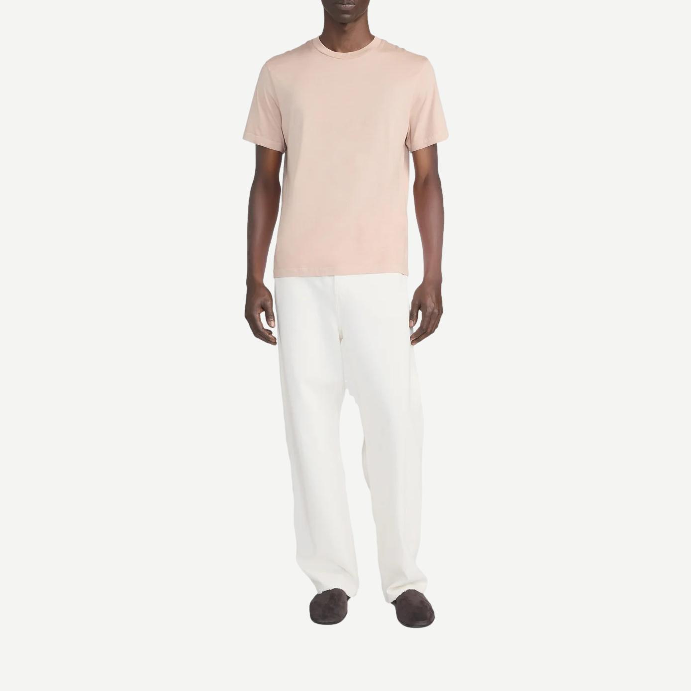 Light peach short-sleeve cotton T-shirt by Frame Denim, casual fit with soft fabric and simple crew neckline.