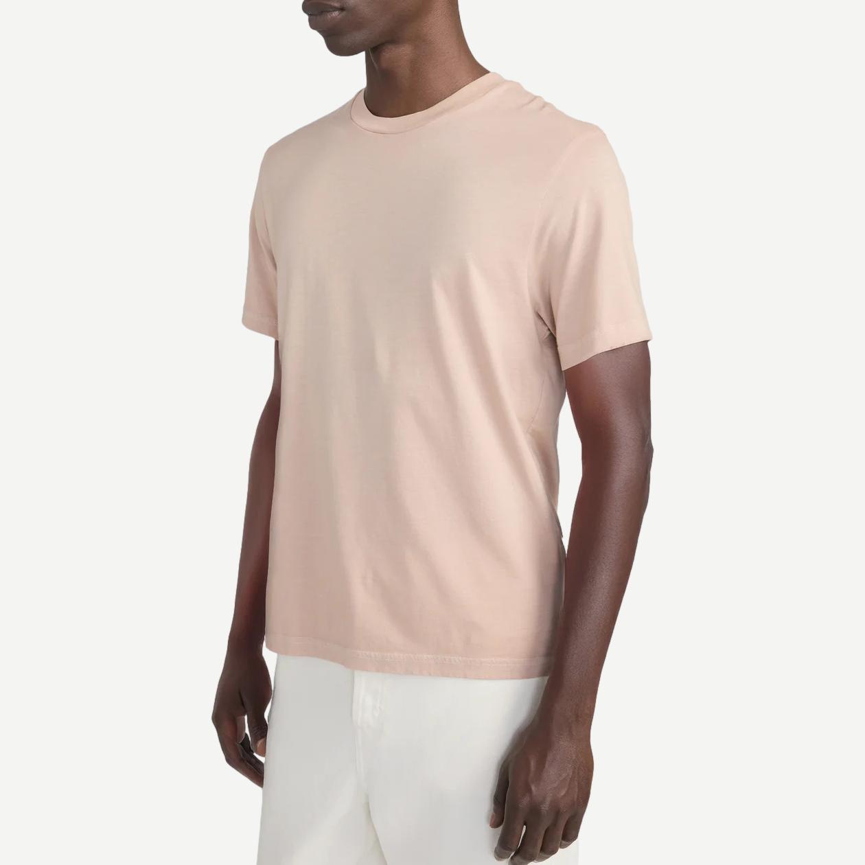 Light peach cotton T-shirt by Frame Denim, short sleeve, casual fit, soft fabric, shown on a neutral background.