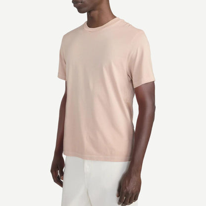 Light peach cotton T-shirt by Frame Denim, short sleeve, casual fit, soft fabric, shown on a neutral background.