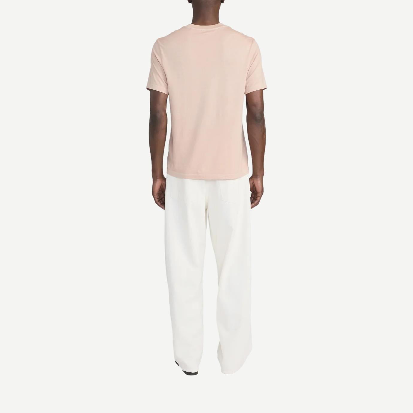 Light pale peach cotton T-shirt by Frame Denim, short-sleeve casual tee with a soft fabric appearance and classic fit.