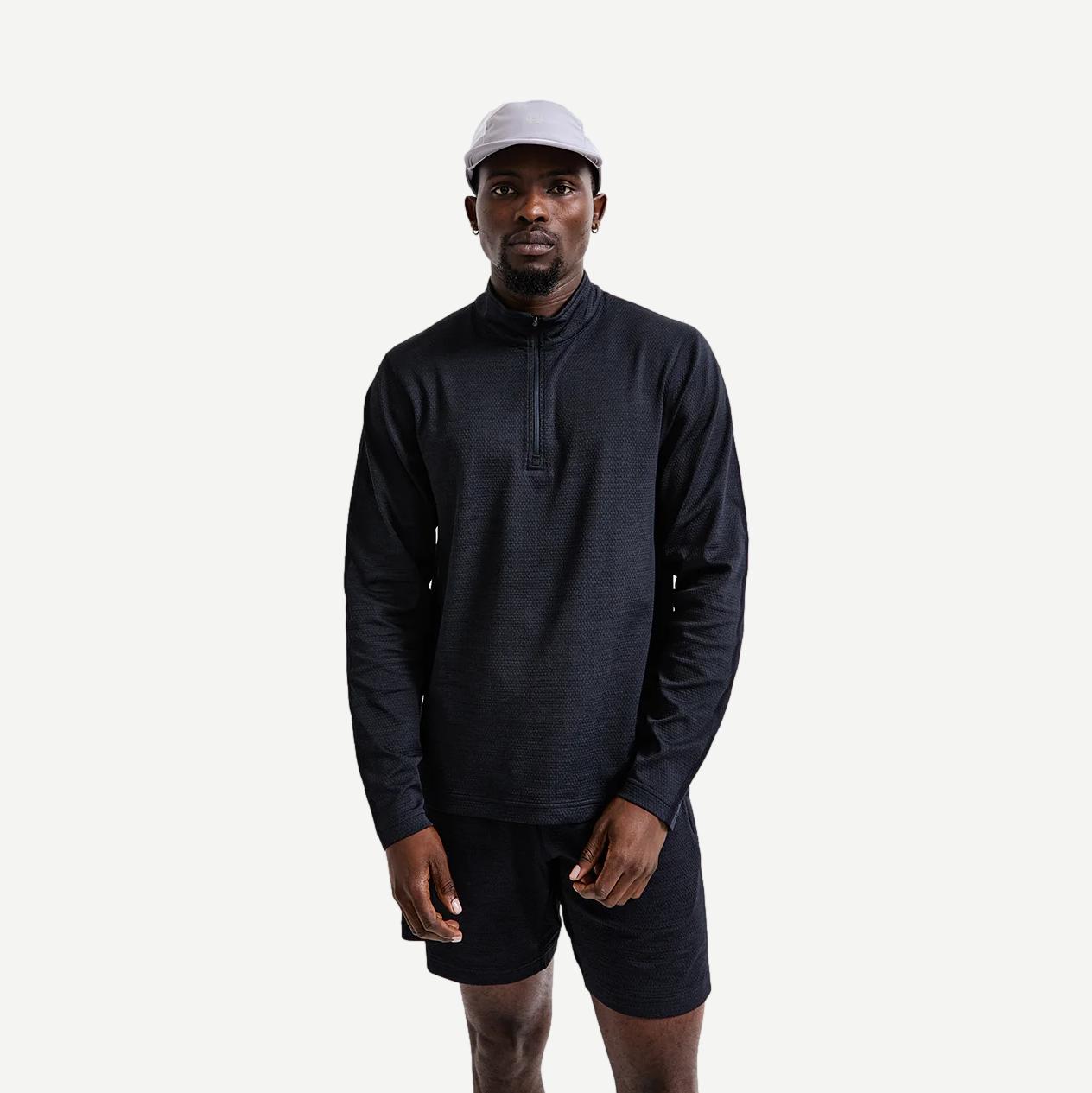 Reigning Champ navy Solotex Mesh Tiebreak 7-inch shorts with a quarter zip detail, lightweight athletic design, and breathable fabric.