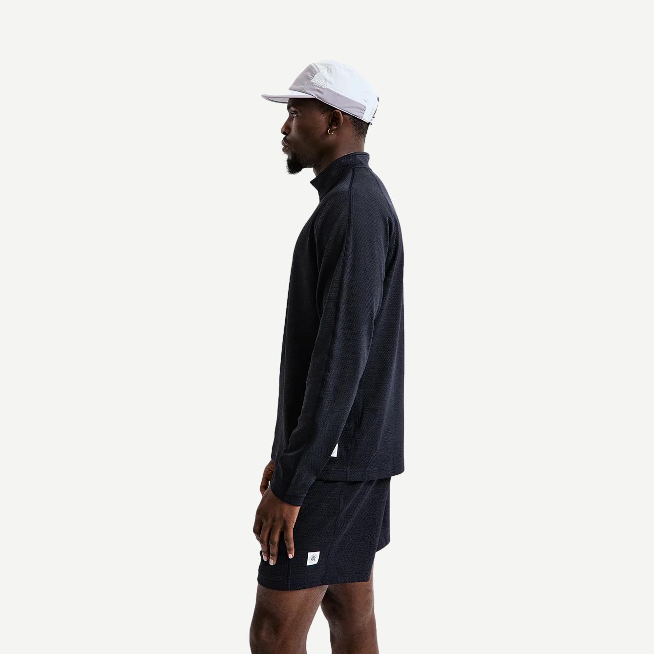 Reigning Champ navy Solotex Mesh Tiebreak 7-inch shorts with mesh fabric and drawstring waist, shown laid flat.