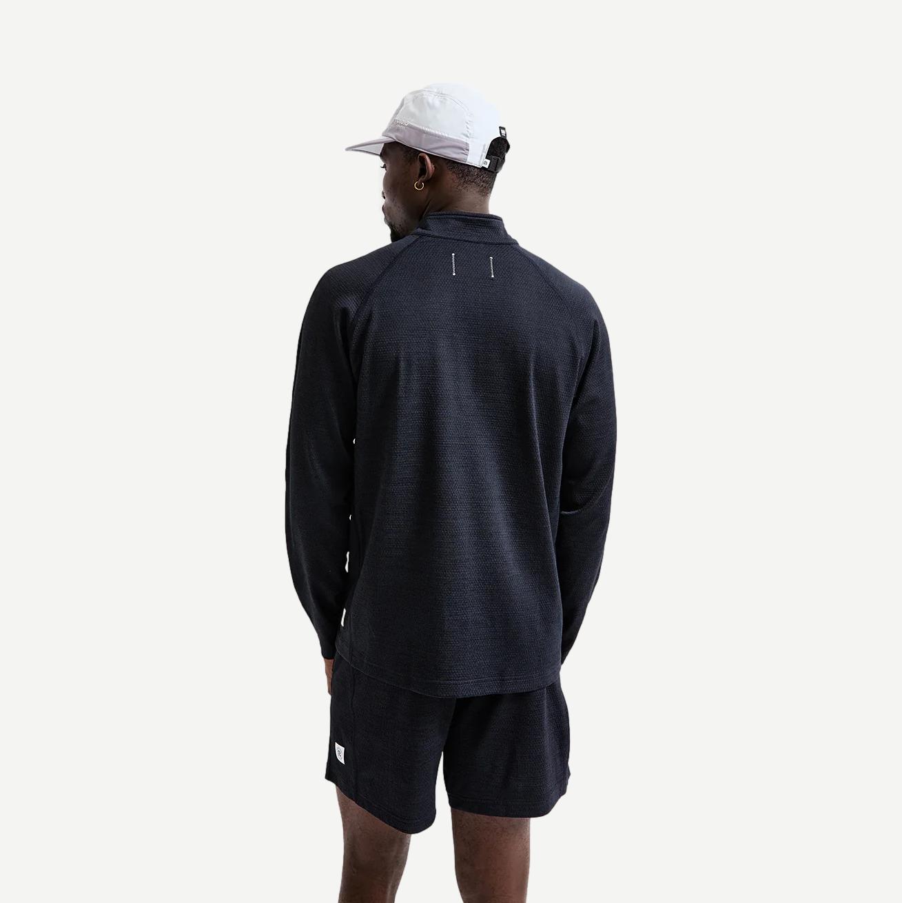Reigning Champ navy Solotex Mesh Tiebreak Short 7-inch laid flat showing lightweight fabric and athletic fit.