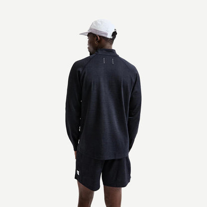 Reigning Champ navy Solotex Mesh Tiebreak Short 7-inch laid flat showing lightweight fabric and athletic fit.